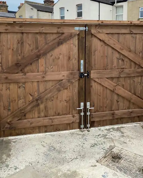 Pair of new timber driveway gates with braced frames